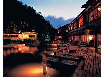 Hotel facade at night.